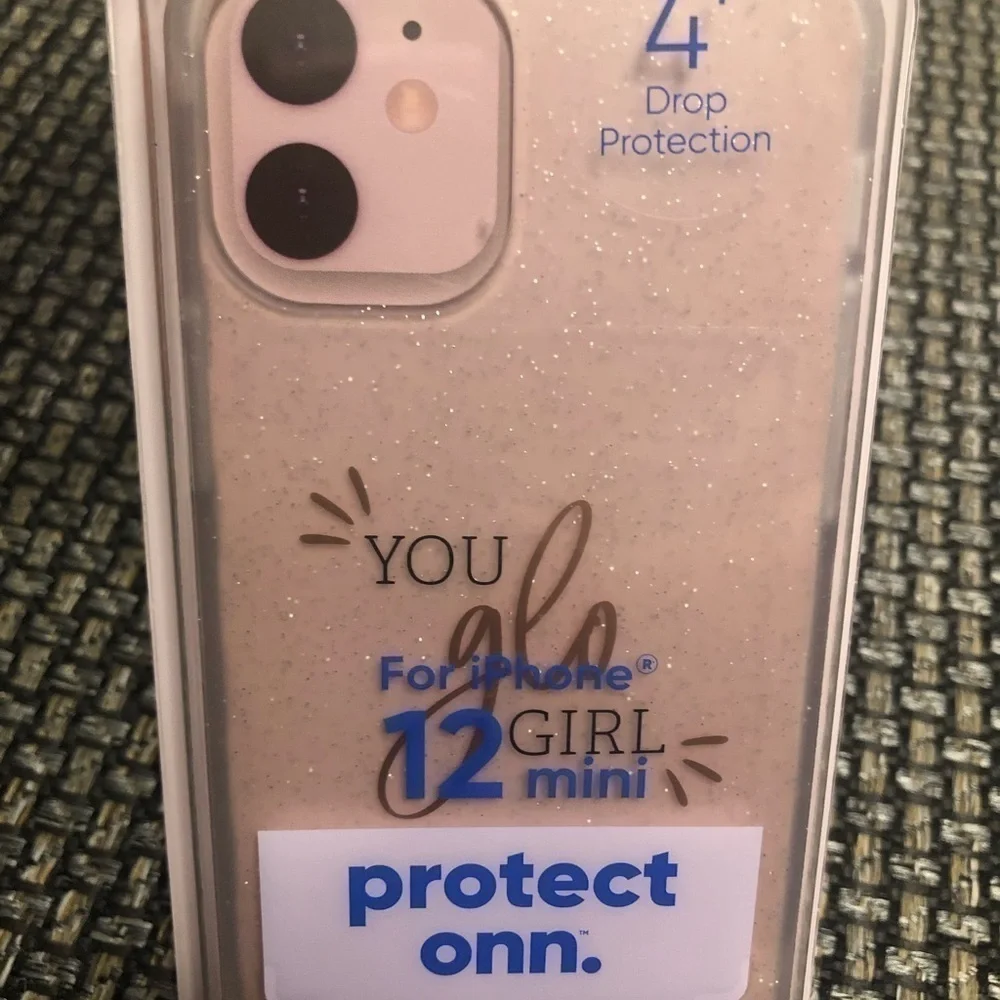 iPhone 12 mini phone case. Clear glittery says you glo girl on the back